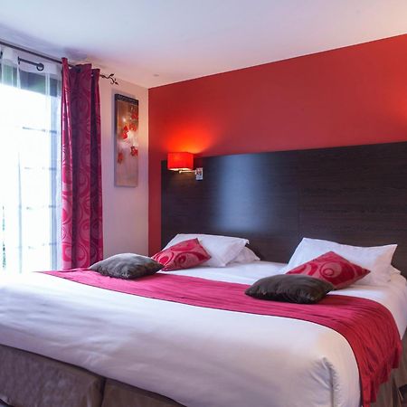 Hotel Restaurant Les Coquelicots, The Originals Relais 圣帕尔杜洛尔蒂日耶 外观 照片